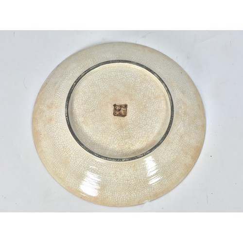 315 - JAPANESE CRACKLE GLAZED CHARGER WITH WARRIOR DECORATION APPROX. 33 cms DIAMETER AF 30-50