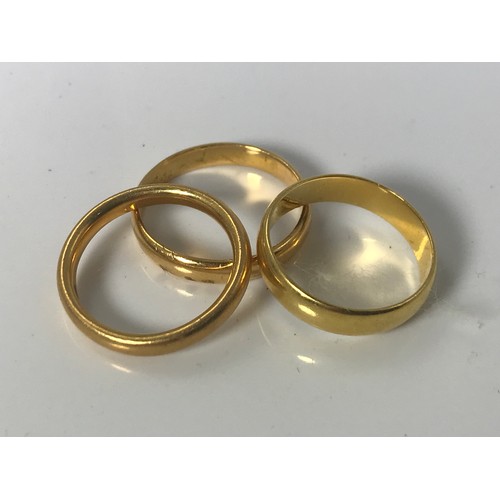 793 - THREE 22 CARAT GOLD WEDDING BANDS APPROX. 12g