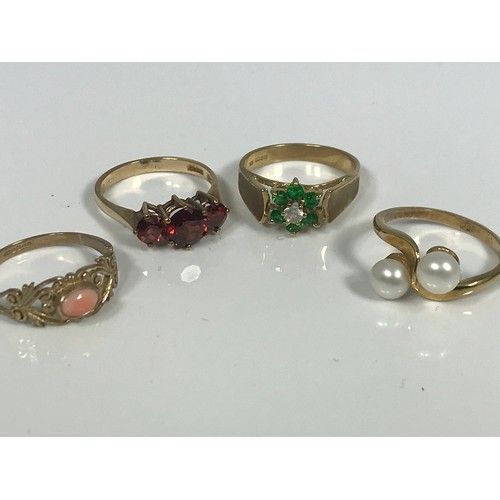 781 - 4 VARIOUS 9 CARAT GOLD COSTUME RINGS