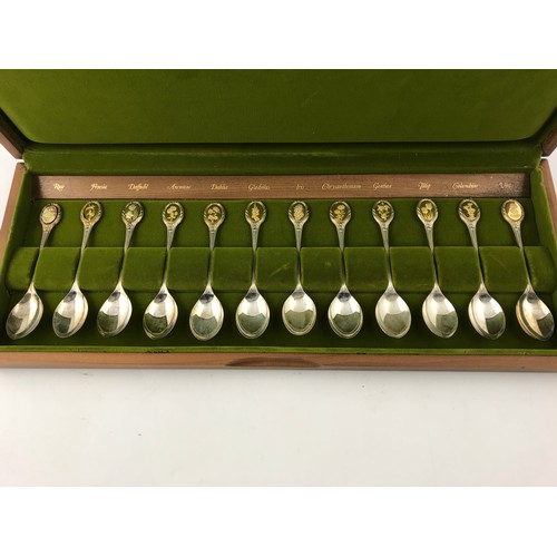 651 - SET OF 12 SILVER ROYAL HORTICULTURAL SOCIETY FLOWER SPOONS J PINCHES LTD IN PRESENTATION BOX