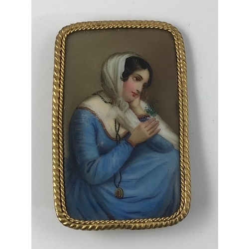 801 - 19TH CENTURY CONTINENTAL PORCELAIN BROOCH IN THE BERLIN STYLE PAINTED WITH A PORTRAIT OF A LADY, app... 