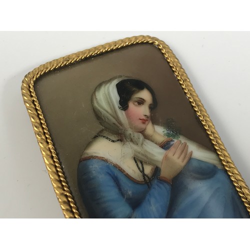 801 - 19TH CENTURY CONTINENTAL PORCELAIN BROOCH IN THE BERLIN STYLE PAINTED WITH A PORTRAIT OF A LADY, app... 