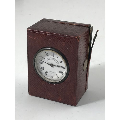 874 - GOOD QUALITY MINIATURE TRAVEL CLOCK, W.THORNHILL & CO. 144-145 NEW BOND STREET, IN MOROCCO LEATHER C... 