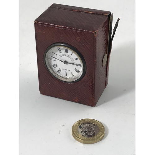 874 - GOOD QUALITY MINIATURE TRAVEL CLOCK, W.THORNHILL & CO. 144-145 NEW BOND STREET, IN MOROCCO LEATHER C... 