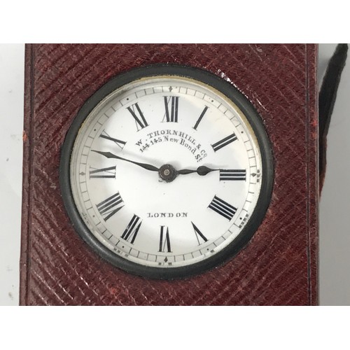 874 - GOOD QUALITY MINIATURE TRAVEL CLOCK, W.THORNHILL & CO. 144-145 NEW BOND STREET, IN MOROCCO LEATHER C... 