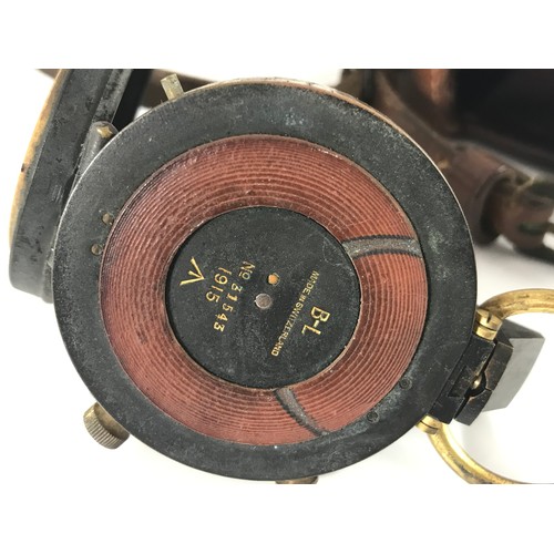 211 - WWI MARCHING COMPASS, MADE IN SWITZERLAND, DATED 1915, COMPLETE WITH LEATHER CASE