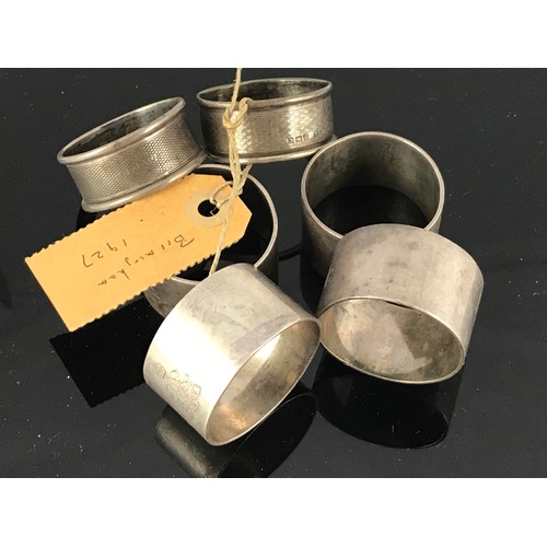 606 - 6 VARIOUS SILVER SERVIETTE RINGS, approx. 202g gross