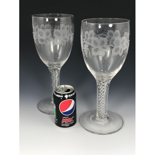 373 - PAIR OF LARGE AND IMPRESSIVE ETCHED GLASS GOBLETS WITH VINE LEAF DECORATION AND AIR TWIST STEMS, APP... 