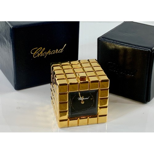 876 - CHOPARD ICE CUBE TRAVEL CLOCK, GILT FINISH WITH BLACK DIAL IN ORIGINAL TRAVEL CASE AND OUTER BOX, MO... 