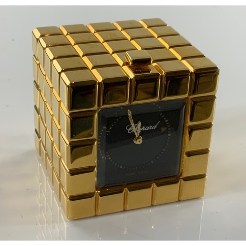 876 - CHOPARD ICE CUBE TRAVEL CLOCK, GILT FINISH WITH BLACK DIAL IN ORIGINAL TRAVEL CASE AND OUTER BOX, MO... 