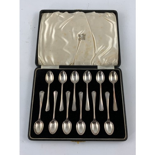 653 - CASED SET OF 12 SILVER TEA SPOONS