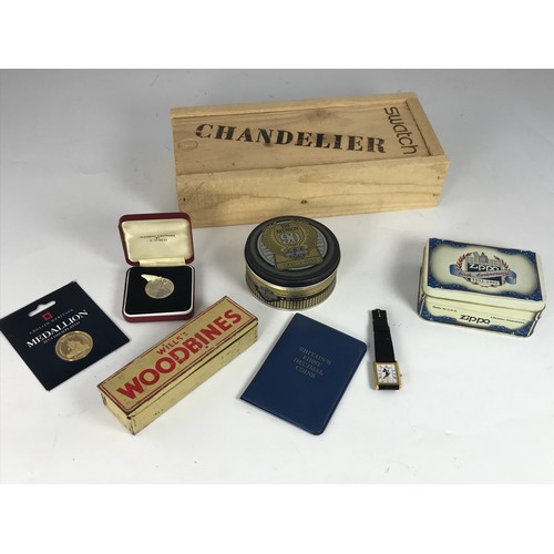 838 - SWATCH CHANDELIER LADIES WRIST WATCH WITH ORIGINAL BOX AND STAND TOGETHER WITH A ZIPPO PRESENTATION ... 