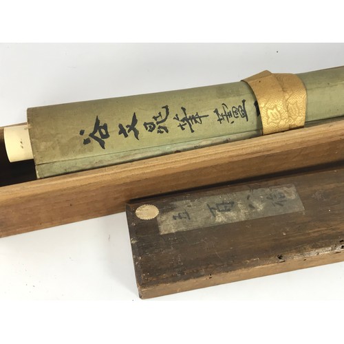 57 - CHINESE SCROLL IN FITTED WOODEN BOX, panel approx. 115 x 49.5 cm