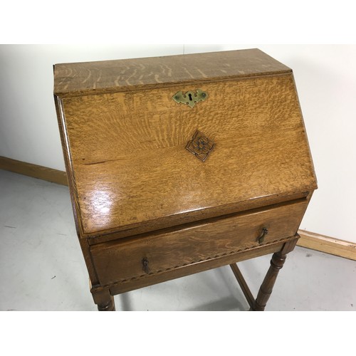 1294 - 20th CENTURY FALL FRONT OAK BUREAU ON STAND WITH DAVIS & DAVIS LTD. FOLKESTONE IVORINE LABEL TO DRAW... 