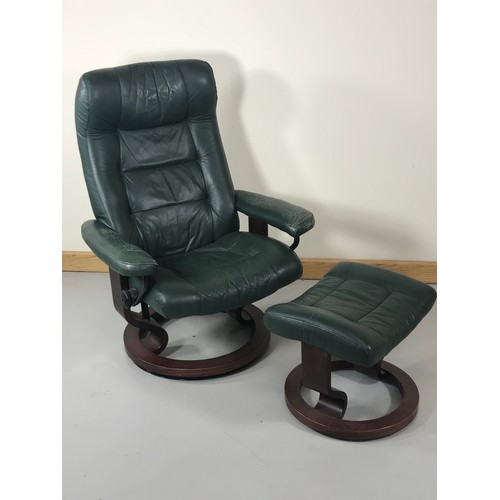 1278 - GREEN LEATHER STRESSLESS ARM CHAIR AND MATCHING FOOT STOOL THE LEATHER IS QUITE WORN