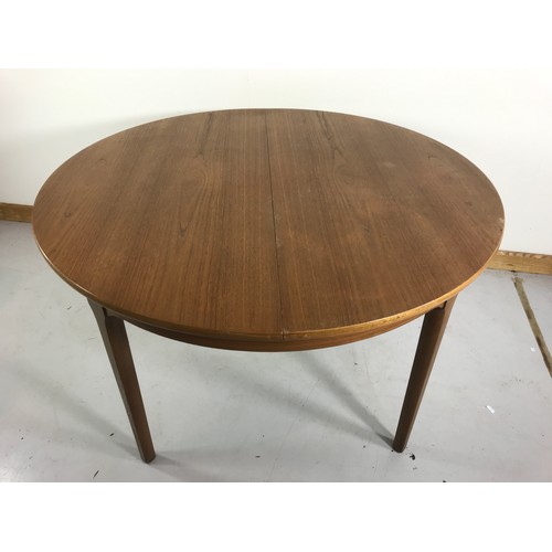 1287 - ROUND G PLAN EXTENDING DINING TABLE, approx. 122 cm dia. Plus leaf