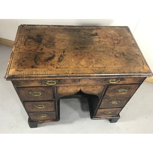 1075 - 18TH CENTURY GEORGIAN WALNUT KNEE HOLE DESK ON BRACKET FEET HAVING BRASS HANDLES APPROX. 81 cm WIDE