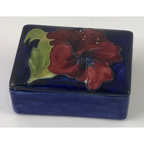 1717 - RECTANGULAR MOORCROFT BLUE GROUND BOX AND COVER WITH HIBISCUS DECORATION AF