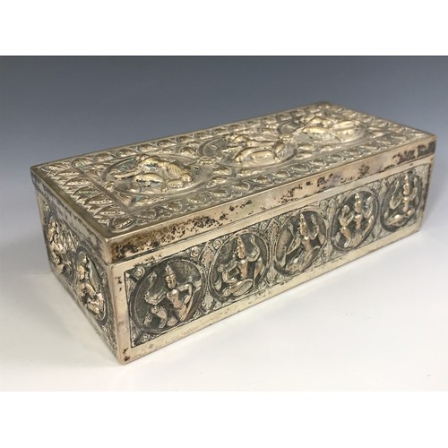 3348 - A HIGHLY DETAILED RECTANGULAR INDIAN SILVER LIDDED BOX DEPICTING INDIAN DEITIES HAVING HINGED LID AP... 