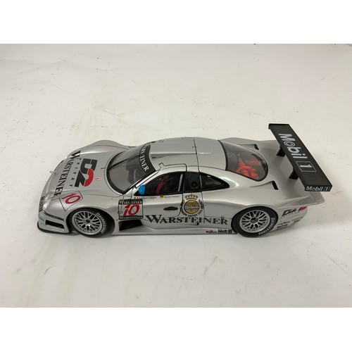 328 - 3 UNBOXED MODELS MAISTO PLINTHED PORSCHE 911 GT1, LA MANS (1998) PLUS A MAISTO MERCEDES CLK-GTR UNBO... 