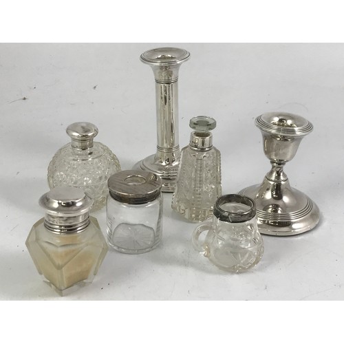 3413 - MISC. SILVER INC. LOADED CANDLESTICKS, SILVER TOP BOTTLES ETC.