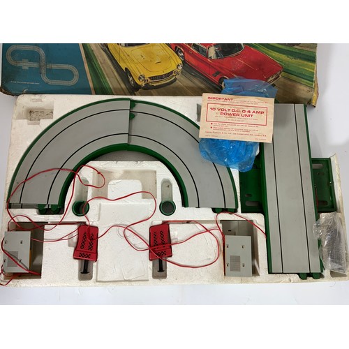 354 - MATCHBOX MOTORWAY PART BOXED SET M2 COMPRISING TRACK, CONTROLLERS, NO CARS, PLUS LAP GARAGE BUILDING... 