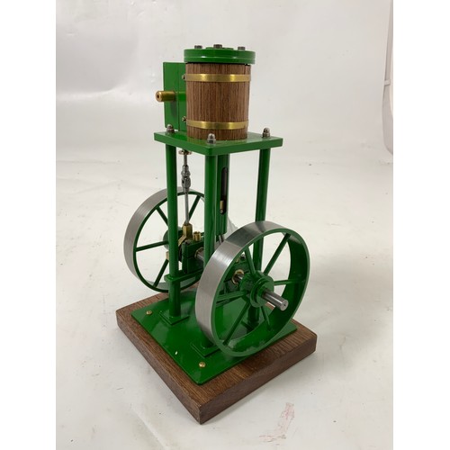 526 - A TWIN FLY WHEEL VERTICAL STEAM ENGINE IN GREEN APPROX. 23 cms HIGH