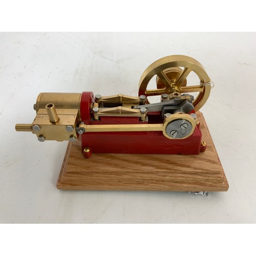 529 - SINGLE CYLINDER HORIZONTAL STEAM ENGINE IN RED