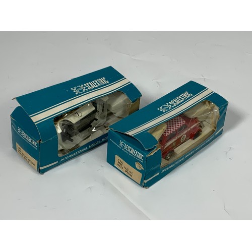 74 - 2 BOXED OLDER SCALEXTRIC INTERNATIONAL MODEL RACING CARS C122, MINI 1275 GT RALLY SPECIAL WITH C.052... 