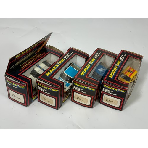 82 - 4 BOXED SCALEXTRIC CARS COMPRISING C283 ROVER 3500, C280 PMG ROVER, C304 AUSTIN MCCAIN, C284 POLICE ... 