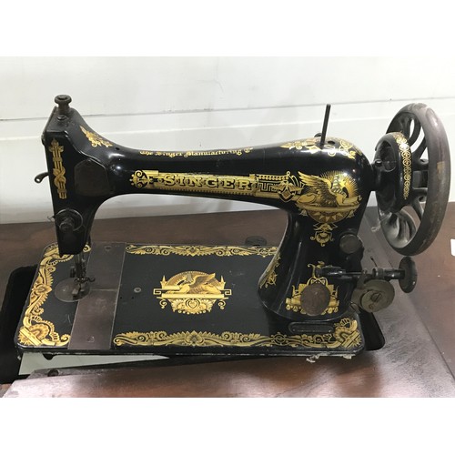 1542 - SINGER SEWING MACHINE ON STAND