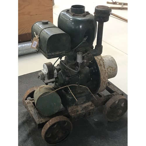 602 - WOLSELEY SINGLE CYLINDER VERTICAL ENGINE WITH SINGLE FLY WHEEL ON TROLLEY WITH ORIGINAL PLATE WOLSEL... 