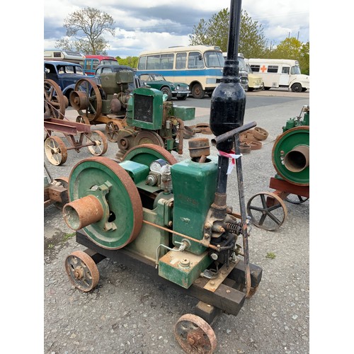 686 - A WOLSELEY OPEN CRANK SINGLE CYLINDER TWIN FLY WHEEL ENGINE ON TROLLEY A PETROL PARAFIN ENGINES