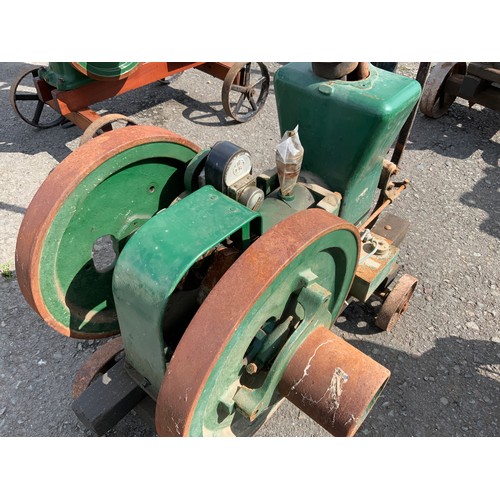 686 - A WOLSELEY OPEN CRANK SINGLE CYLINDER TWIN FLY WHEEL ENGINE ON TROLLEY A PETROL PARAFIN ENGINES