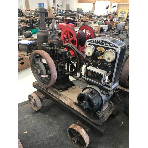 694 - A PETTER JUNIOR 2.5 BHP SINGLE CYLINDER VERTICAL ENGINE WITH TWIN FLY WHEEL WITH BELT CONNECTED TO A... 