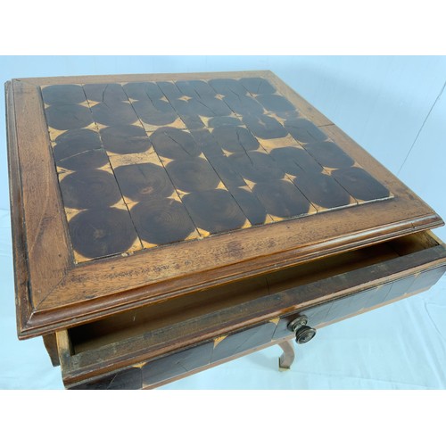 150 - MAHOGANY TABLE ON UP TURNED TRIPOD BASE WITH BRASS CASTERS, FRIEZE DRAWER AND TOP DECORATED WITH OYS... 