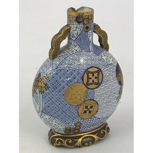 279 - SMALL ORIENTAL MOON SHAPED VASE WITH BLUE AND GILT DECORATION, AF, approx. 14 cm