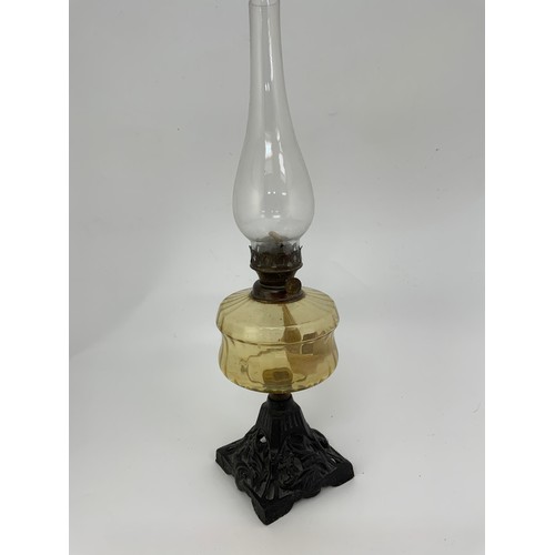 323 - GLASS OIL LAMP WITH CAST BASE AND GLASS RESERVOIR PLUS SUNDRY OTHER METAL WARE AND CHINA