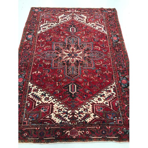 520 - LARGE, RED GROUND RUG, approx. 312 x 222 cm