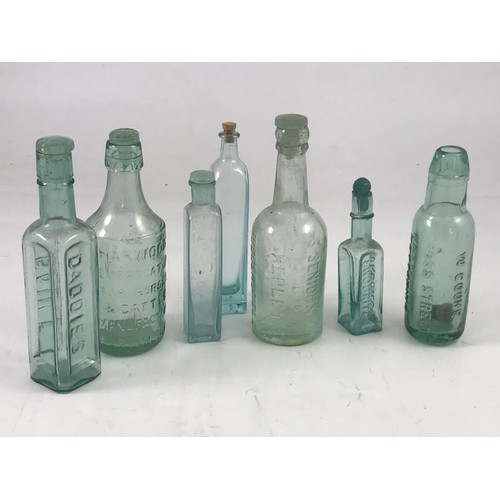 128 - QUANTITY MISC. OLD GLASS SAUCE BOTTLES, HARWOODS EMBROCATION BOTTLE ETC.