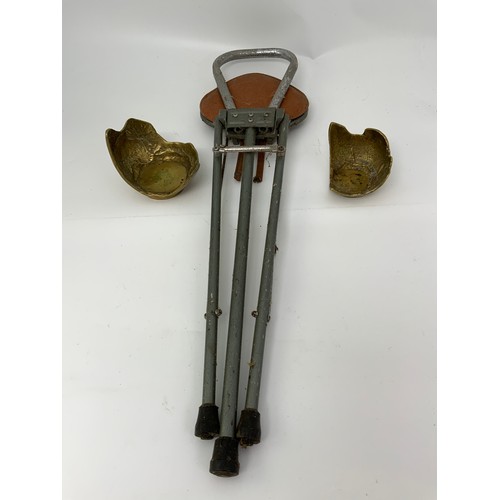 338 - 2 HEAVY BRASS CANDLE HOLDERS AND A SHOOTING STICK