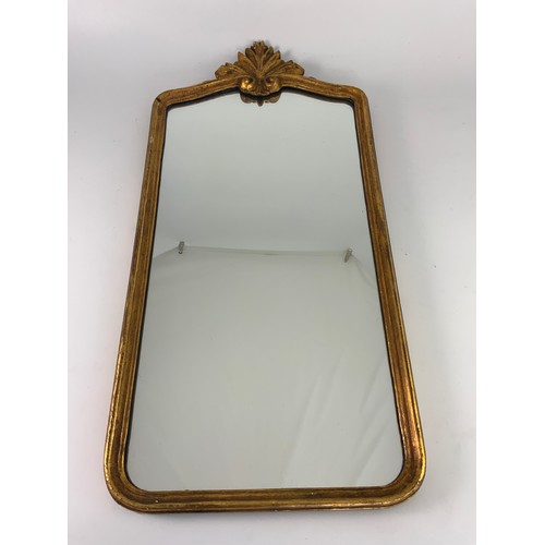 73 - GILT FRAMED MIRROR, approx. 70 x 34 cm