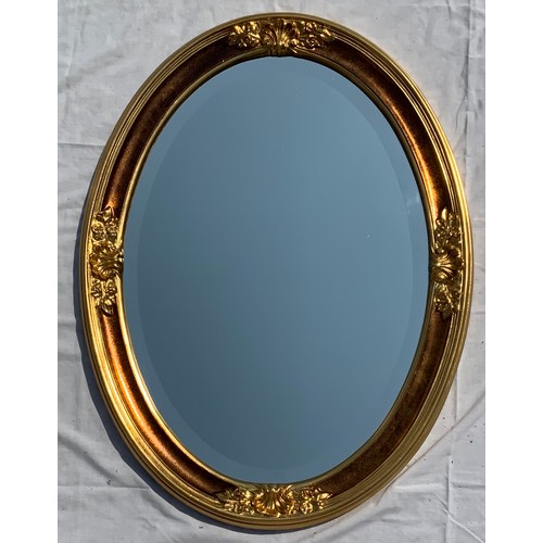 64 - OVAL GILT FRAMED MIRROR