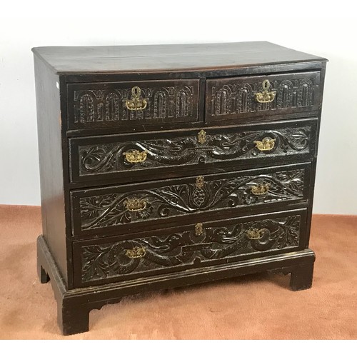 28 - CARVED OAK CHEST OF 2 OVER 3 DRAWERS POSSIBLY 17TH CENTURY APPROX 100 cm