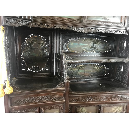 115 - JAPANESE STYLE CARVED AND PAINTED SIDE CABINET HAVING 2 LACQUERED PAINTED SLIDING DOORS OVER SIMILAR... 