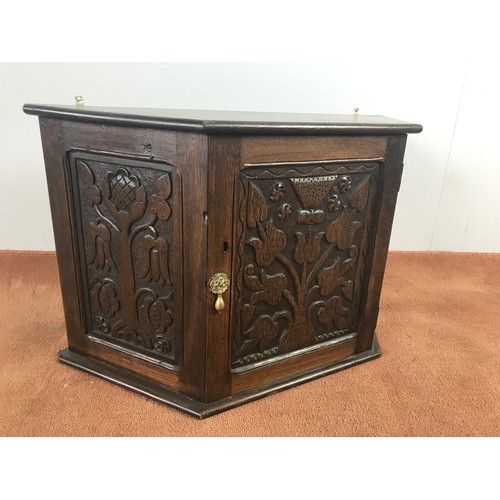 98 - CARVED OAK WALL CABINET