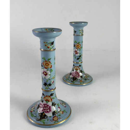 128 - PAIR OF BLUE PORCELAIN CANDLESTICKS WITH LABEL WILLIAM RIDGEWAY HAVING HAND PAINTED FLORAL DECORATIO... 