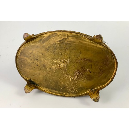 264 - GILT METAL CASKET WITH HINGED COVER, MARKED 'DEPOSE 247', HAVING BUTTONED SILK INTERIOR