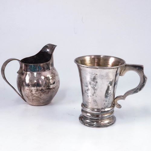 376 - WHITE METAL TANKARD AND A WHITE METAL CREAM JUG