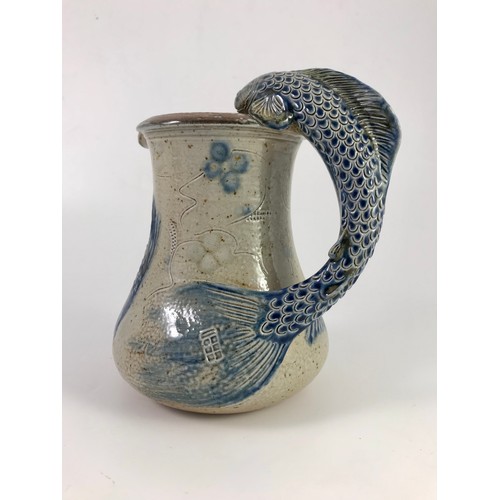 117 - TOFF MILWAY (BRITISH BORN 1949) BLUE SALT GLAZED TANKARD WITH FISH HANDLE AND FISH DECORATION TOGETH... 